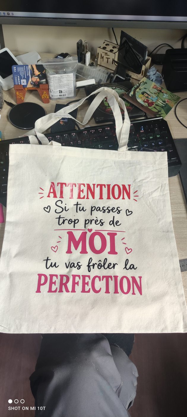 Sac en toile naturelle marqué d’un texte en deux couleurs
